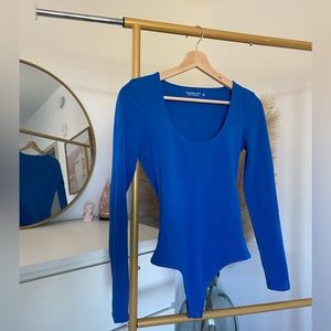 Brand new, tags removed but never worn, perfect condition